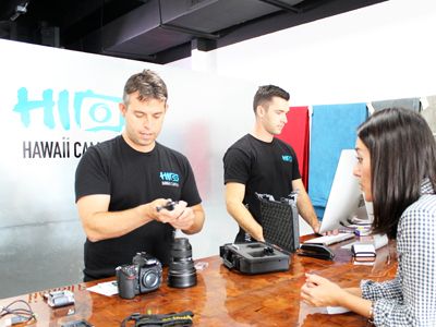 Hawaii Camera Associate Working With Customer